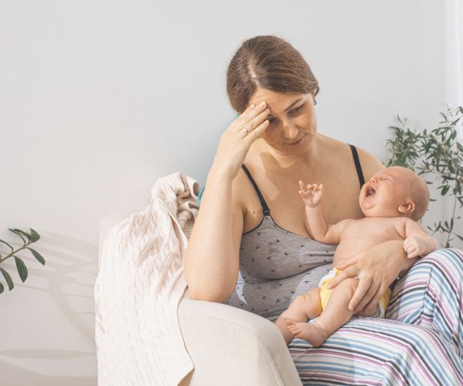 blocked milk ducts woman baby breastfeeding
